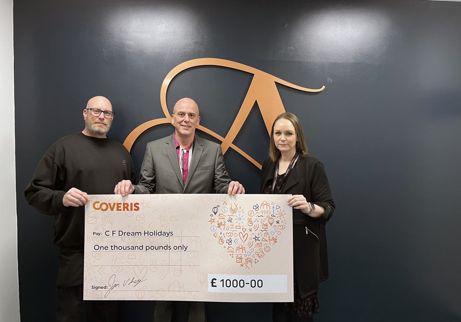 Amberley Labels employees celebrate 4,000 injury-free days with a charitable donation