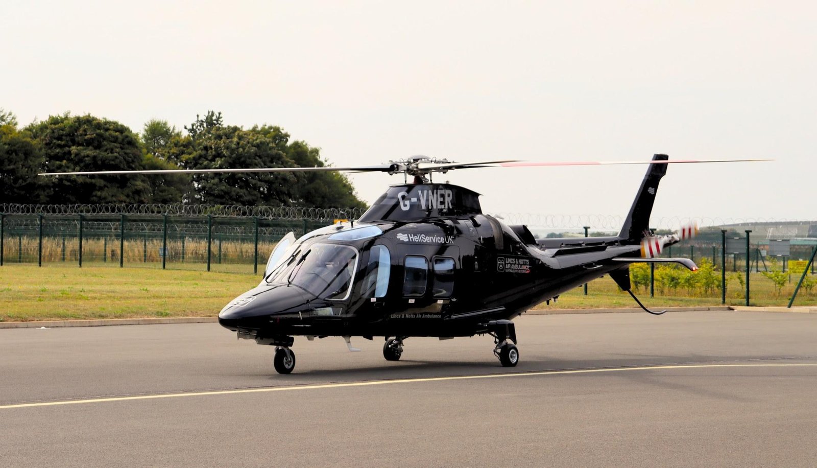 Relief helicopter lands as iconic yellow ambucopter flies to Germany for major MOT