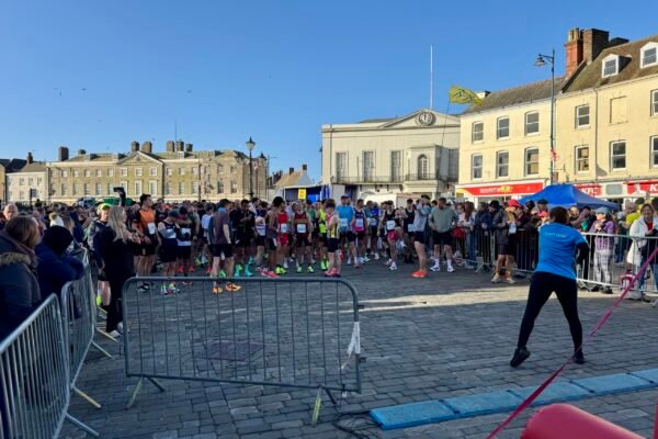 Athletes warmed up thanks to staff from Princess Royal Sports Arena ahead of the Full Marathon launch in Boston's Market Place Athletes warmed up thanks to staff from Princess Royal Sports Arena ahead of the Full Marathon launch in Boston's Market Place