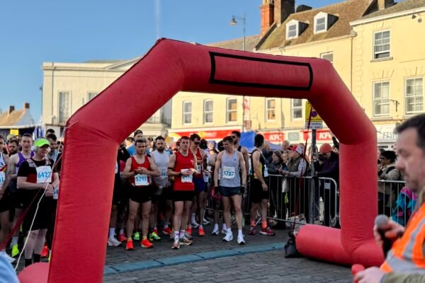 Runners prime themselves for the launch of the 2026 Full Marathon in Boston's Market Place Runners prime themselves for the launch of the 2026 Full Marathon in Boston's Market Place